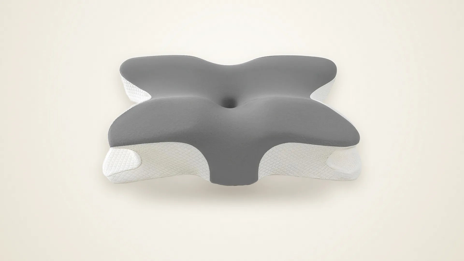 The SleepSculpt pillow in Light Grey, showing its butterfly shape, side wings and central head hollow